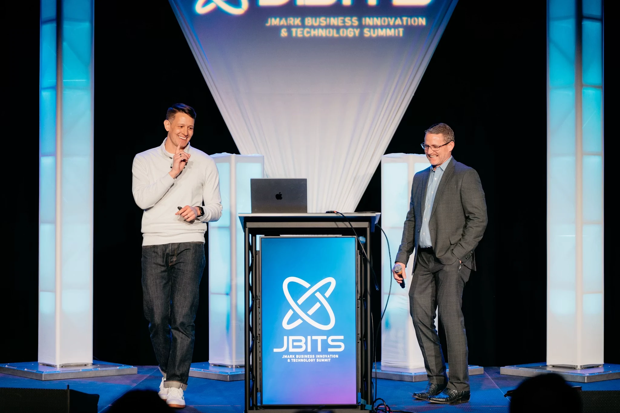 Mostly Serious leading a practical AI training session at the JMARK Business Innovation and Technology Summit.