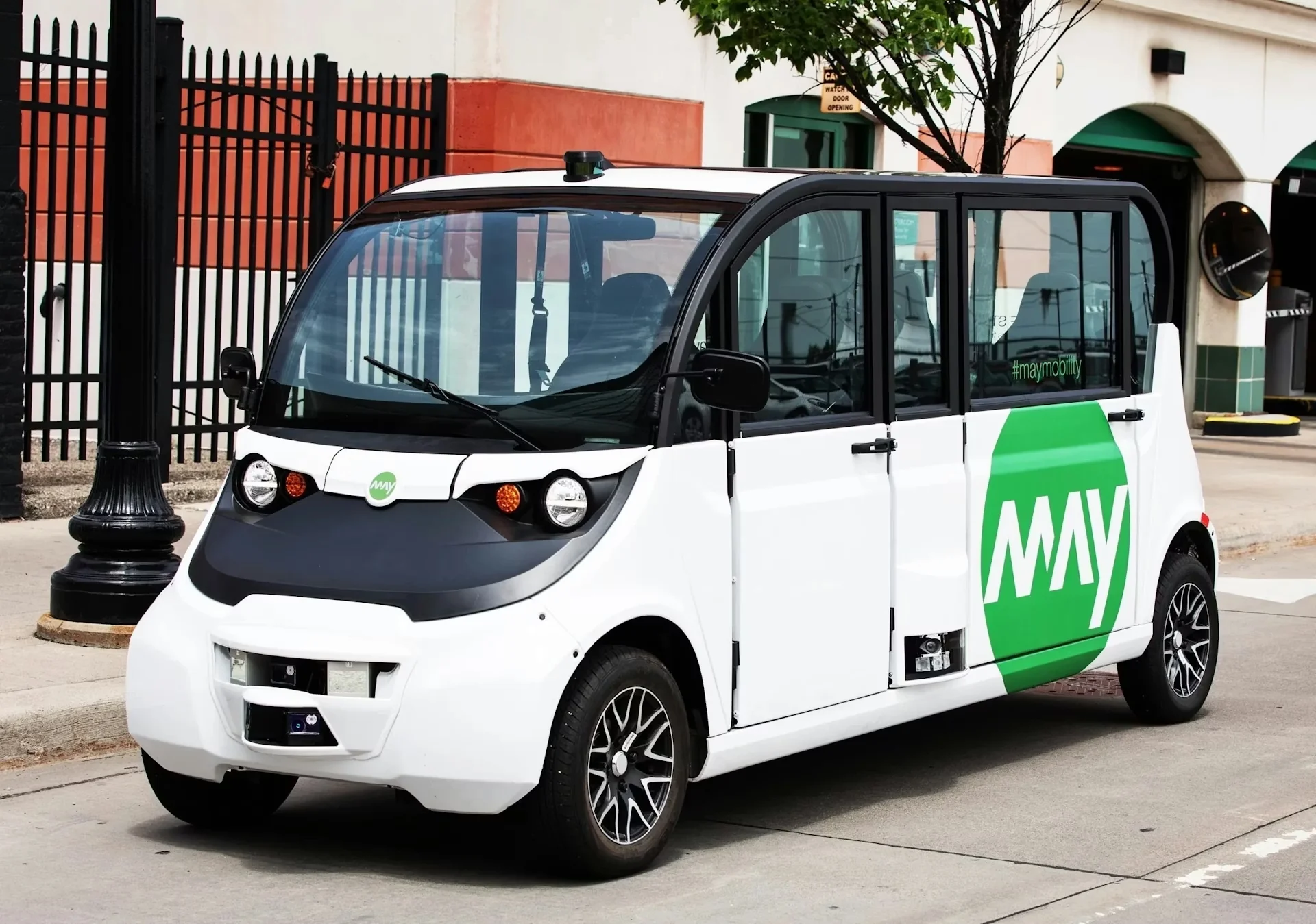A white electric transit vehicle.